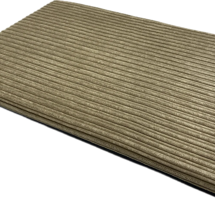 A rectangular mat with in a beige colour, shown at an angle on a plain white background.