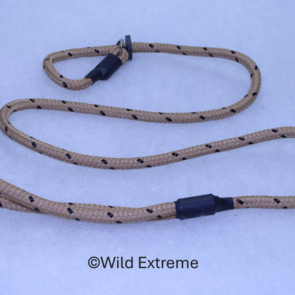 Beige dog leash with black spots on a white background, branded 'Wild Extreme'.