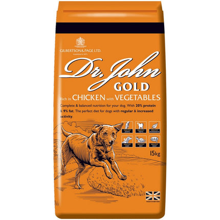 A bag of Dr John Gold Chicken & Vegetables dry dog food, with an image of a dog on the front.